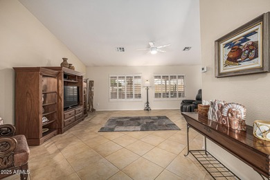 This immaculate, well-maintained home is nestled in a quiet on Tuscany Falls At Pebble Creek in Arizona - for sale on GolfHomes.com, golf home, golf lot