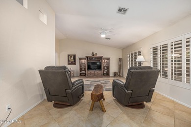 This immaculate, well-maintained home is nestled in a quiet on Tuscany Falls At Pebble Creek in Arizona - for sale on GolfHomes.com, golf home, golf lot