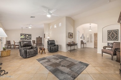 This immaculate, well-maintained home is nestled in a quiet on Tuscany Falls At Pebble Creek in Arizona - for sale on GolfHomes.com, golf home, golf lot