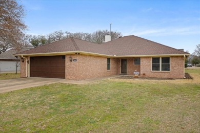 This beautiful 3-bedroom, 2-bathroom home is situated on a on De Cordova Bend Country Club in Texas - for sale on GolfHomes.com, golf home, golf lot