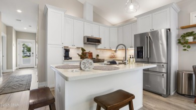 This like-new beach retreat in the quiet gated community of on Camp Creek Golf Course in Florida - for sale on GolfHomes.com, golf home, golf lot