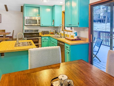 Come see this spacious 4-bedroom, 3-bath split-level, 2-story on Angel Fire Resort Country Club in New Mexico - for sale on GolfHomes.com, golf home, golf lot