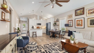 This like-new beach retreat in the quiet gated community of on Camp Creek Golf Course in Florida - for sale on GolfHomes.com, golf home, golf lot