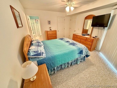 Sharp 2-bedroom, 2-bath condo with Lakeview & lake access on Lake Valley Country Club in Missouri - for sale on GolfHomes.com, golf home, golf lot