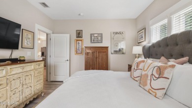 This like-new beach retreat in the quiet gated community of on Camp Creek Golf Course in Florida - for sale on GolfHomes.com, golf home, golf lot