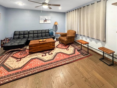 Come see this spacious 4-bedroom, 3-bath split-level, 2-story on Angel Fire Resort Country Club in New Mexico - for sale on GolfHomes.com, golf home, golf lot