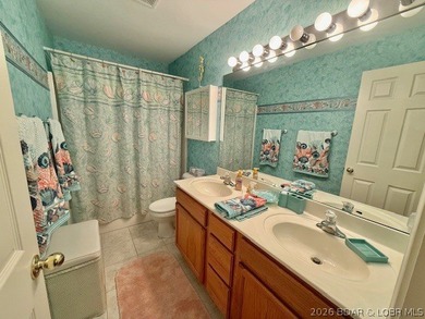 Sharp 2-bedroom, 2-bath condo with Lakeview & lake access on Lake Valley Country Club in Missouri - for sale on GolfHomes.com, golf home, golf lot