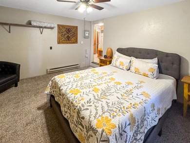 Come see this spacious 4-bedroom, 3-bath split-level, 2-story on Angel Fire Resort Country Club in New Mexico - for sale on GolfHomes.com, golf home, golf lot