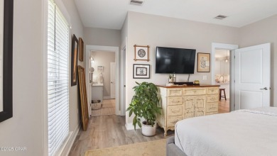 This like-new beach retreat in the quiet gated community of on Camp Creek Golf Course in Florida - for sale on GolfHomes.com, golf home, golf lot