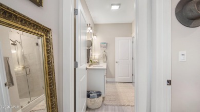 This like-new beach retreat in the quiet gated community of on Camp Creek Golf Course in Florida - for sale on GolfHomes.com, golf home, golf lot