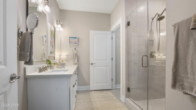 This like-new beach retreat in the quiet gated community of on Camp Creek Golf Course in Florida - for sale on GolfHomes.com, golf home, golf lot