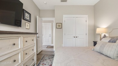 This like-new beach retreat in the quiet gated community of on Camp Creek Golf Course in Florida - for sale on GolfHomes.com, golf home, golf lot