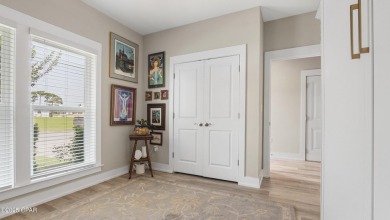 This like-new beach retreat in the quiet gated community of on Camp Creek Golf Course in Florida - for sale on GolfHomes.com, golf home, golf lot