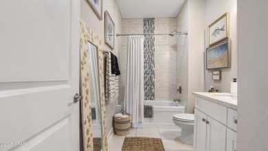 This like-new beach retreat in the quiet gated community of on Camp Creek Golf Course in Florida - for sale on GolfHomes.com, golf home, golf lot