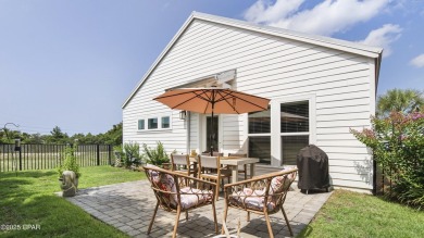 This like-new beach retreat in the quiet gated community of on Camp Creek Golf Course in Florida - for sale on GolfHomes.com, golf home, golf lot