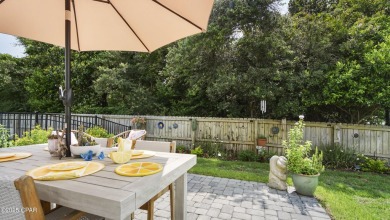 This like-new beach retreat in the quiet gated community of on Camp Creek Golf Course in Florida - for sale on GolfHomes.com, golf home, golf lot