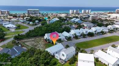 This like-new beach retreat in the quiet gated community of on Camp Creek Golf Course in Florida - for sale on GolfHomes.com, golf home, golf lot