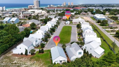 This like-new beach retreat in the quiet gated community of on Camp Creek Golf Course in Florida - for sale on GolfHomes.com, golf home, golf lot