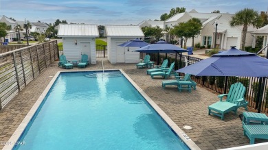 This like-new beach retreat in the quiet gated community of on Camp Creek Golf Course in Florida - for sale on GolfHomes.com, golf home, golf lot