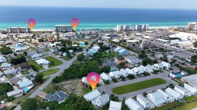 This like-new beach retreat in the quiet gated community of on Camp Creek Golf Course in Florida - for sale on GolfHomes.com, golf home, golf lot