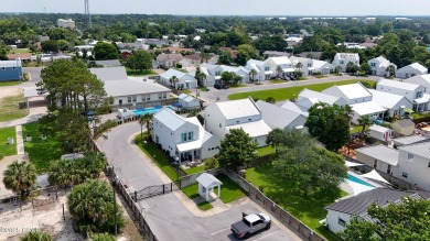 This like-new beach retreat in the quiet gated community of on Camp Creek Golf Course in Florida - for sale on GolfHomes.com, golf home, golf lot