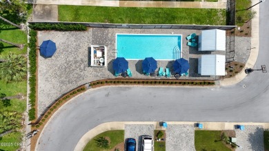 This like-new beach retreat in the quiet gated community of on Camp Creek Golf Course in Florida - for sale on GolfHomes.com, golf home, golf lot