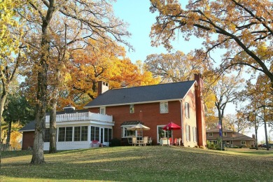 Colonial elegance that checks all the boxes!  This 5 bedroom/5 on Cedar Ridge Golf Course in Iowa - for sale on GolfHomes.com, golf home, golf lot