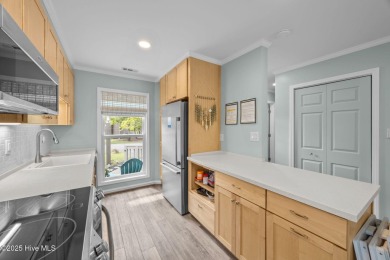 Enjoy captivating water views from nearly every room in this on Harbour Point Golf Club in North Carolina - for sale on GolfHomes.com, golf home, golf lot