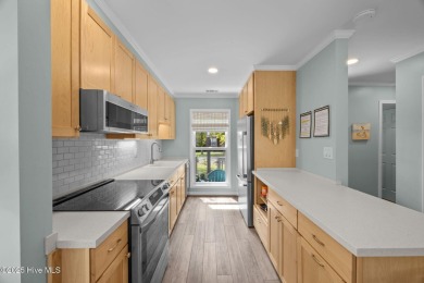 Enjoy captivating water views from nearly every room in this on Harbour Point Golf Club in North Carolina - for sale on GolfHomes.com, golf home, golf lot