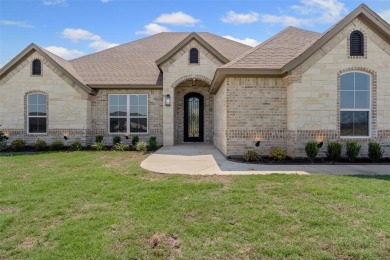 Welcome to luxury living in the prestigious, gated community of on Pecan Plantation Country Club in Texas - for sale on GolfHomes.com, golf home, golf lot