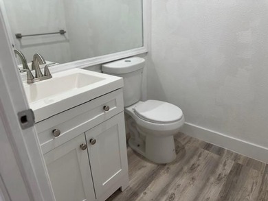 Renovated Waterfront Villa! Freshly painted, vinyl wood flooring on Kings Point Golf -Flanders Way in Florida - for sale on GolfHomes.com, golf home, golf lot