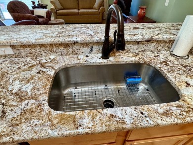 Location, location, location! This beautifully maintained and on The Links of Spruce Creek in Florida - for sale on GolfHomes.com, golf home, golf lot