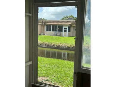 Renovated Waterfront Villa! Freshly painted, vinyl wood flooring on Kings Point Golf -Flanders Way in Florida - for sale on GolfHomes.com, golf home, golf lot