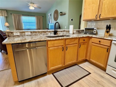 Location, location, location! This beautifully maintained and on The Links of Spruce Creek in Florida - for sale on GolfHomes.com, golf home, golf lot