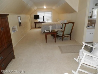 Nestled near the scenic Western Golf Course, this beautifully on Western Golf and Country Club in Michigan - for sale on GolfHomes.com, golf home, golf lot