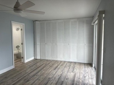Renovated Waterfront Villa! Freshly painted, vinyl wood flooring on Kings Point Golf -Flanders Way in Florida - for sale on GolfHomes.com, golf home, golf lot