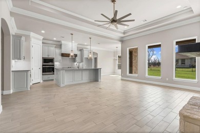 Welcome to luxury living in the prestigious, gated community of on Pecan Plantation Country Club in Texas - for sale on GolfHomes.com, golf home, golf lot