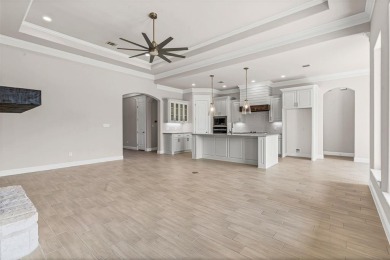 Welcome to luxury living in the prestigious, gated community of on Pecan Plantation Country Club in Texas - for sale on GolfHomes.com, golf home, golf lot