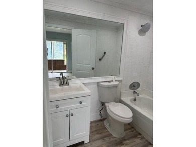 Renovated Waterfront Villa! Freshly painted, vinyl wood flooring on Kings Point Golf -Flanders Way in Florida - for sale on GolfHomes.com, golf home, golf lot
