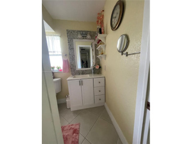 Beautiful and completely remodeled one bedroom in na 55+ on Sunrise Lakes Phase IV Golf Course in Florida - for sale on GolfHomes.com, golf home, golf lot