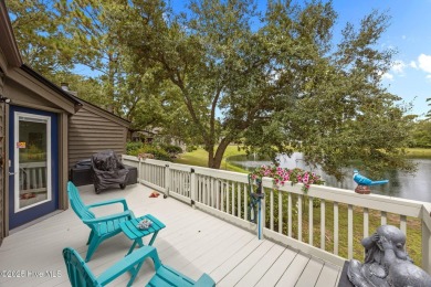 Enjoy captivating water views from nearly every room in this on Harbour Point Golf Club in North Carolina - for sale on GolfHomes.com, golf home, golf lot