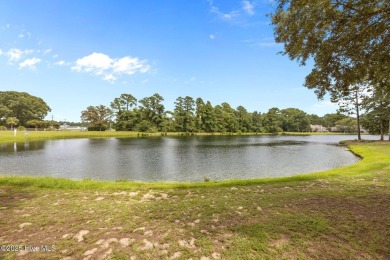 Enjoy captivating water views from nearly every room in this on Harbour Point Golf Club in North Carolina - for sale on GolfHomes.com, golf home, golf lot