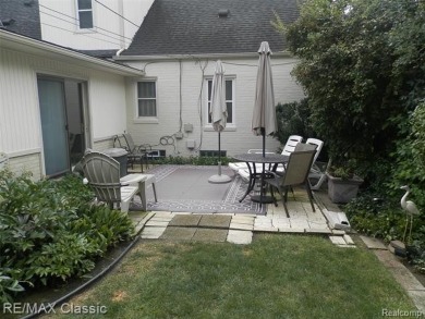 Nestled near the scenic Western Golf Course, this beautifully on Western Golf and Country Club in Michigan - for sale on GolfHomes.com, golf home, golf lot