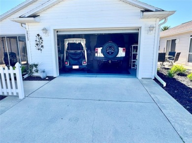 Location, location, location! This beautifully maintained and on The Links of Spruce Creek in Florida - for sale on GolfHomes.com, golf home, golf lot