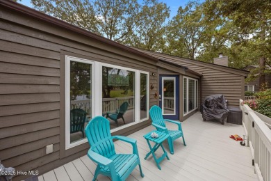 Enjoy captivating water views from nearly every room in this on Harbour Point Golf Club in North Carolina - for sale on GolfHomes.com, golf home, golf lot