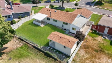 Nestled in the heart of Murray, this beautifully renovated home on Mick Riley Golf Course in Utah - for sale on GolfHomes.com, golf home, golf lot