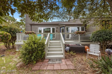 Enjoy captivating water views from nearly every room in this on Harbour Point Golf Club in North Carolina - for sale on GolfHomes.com, golf home, golf lot