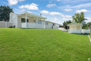 Nestled in the heart of Murray, this beautifully renovated home on Mick Riley Golf Course in Utah - for sale on GolfHomes.com, golf home, golf lot