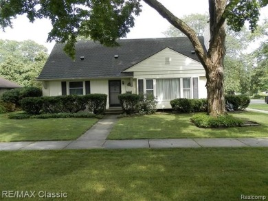 Nestled near the scenic Western Golf Course, this beautifully on Western Golf and Country Club in Michigan - for sale on GolfHomes.com, golf home, golf lot