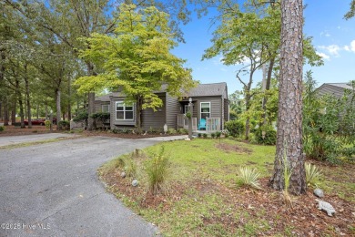 Enjoy captivating water views from nearly every room in this on Harbour Point Golf Club in North Carolina - for sale on GolfHomes.com, golf home, golf lot